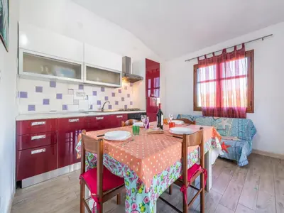 Cucina o angolo cottura di Lovely detached villa in Capo Comino