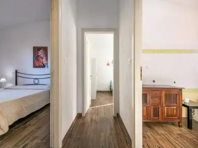 Letto o letti in una camera di Delightful and spacious villa in Capo Comino