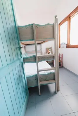 Letto o letti in una camera di Casa Smeraldo Olbia
