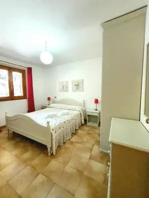Letto o letti in una camera di Le Sunrise - Appartamenti a 350 mt dal mare e con giardino privato