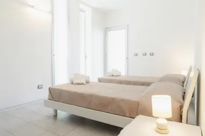 Letto o letti in una camera di Residence L'Ancora