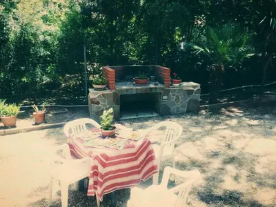 Giardino di Cosy house a walk to the beach!