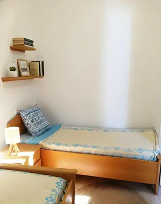 Letto o letti in una camera di LuckyBay