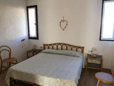 Letto o letti in una camera di Cozy retreat just 150 meters from the beach