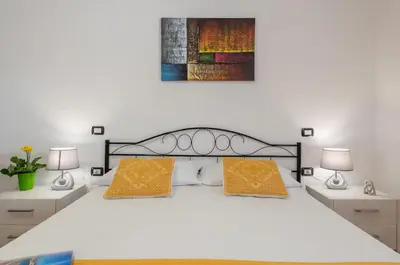 Letto o letti in una camera di Casa Rettore Mura