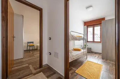 Letto o letti in una camera di Casa Rettore Mura