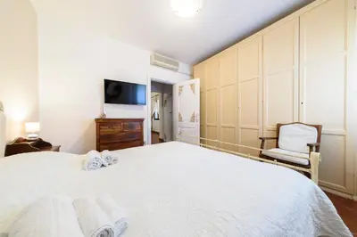 Letto o letti in una camera di Olbia Villa Doriana 2BR 5PX FreePark Jacuzzi