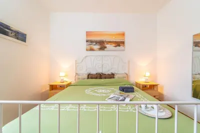 Letto o letti in una camera di villetta ìsabella