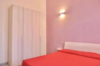 Letto o letti in una camera di ISS Travel, Apartment 4 beds with garden in San Teodoro just 700 mt from la Cinta Beach
