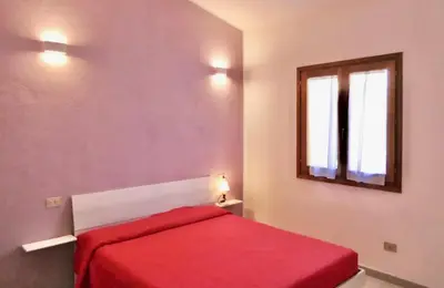 Letto o letti in una camera di ISS Travel, Apartment 4 beds with garden in San Teodoro just 700 mt from la Cinta Beach