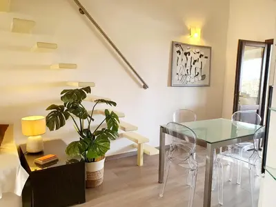 Area soggiorno di Casabel - Appartamento con veranda panoramica a Orosei