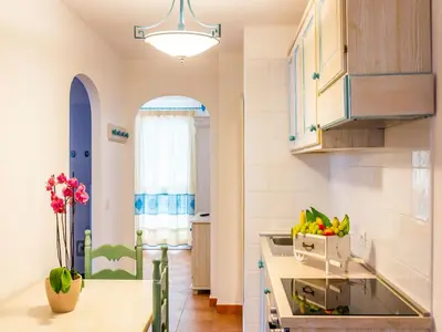 Cucina o angolo cottura di Comfortable accommodation in Orosei