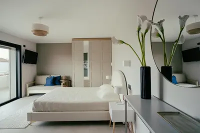 Letto o letti in una camera di villa PAOLA