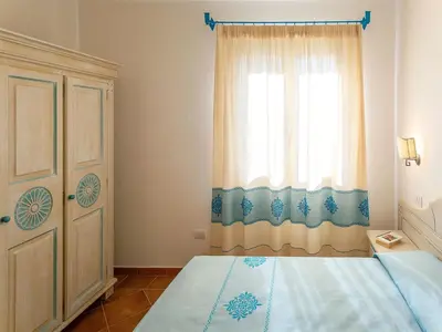 Letto o letti in una camera di Bright accommodation in Orosei
