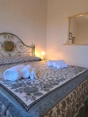 Letto o letti in una camera di Residenze Cielo e Mare - Sole