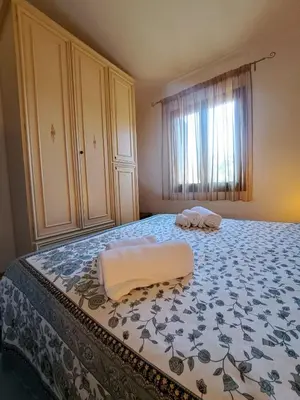 Letto o letti in una camera di Residenze Cielo e Mare - Sole