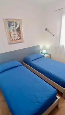 Letto o letti in una camera di Casa Zia Sa'