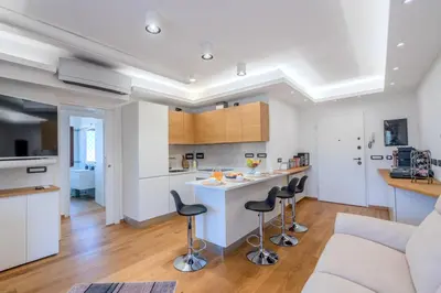 Cucina o angolo cottura di OlbiAmare Appartamento di Lusso