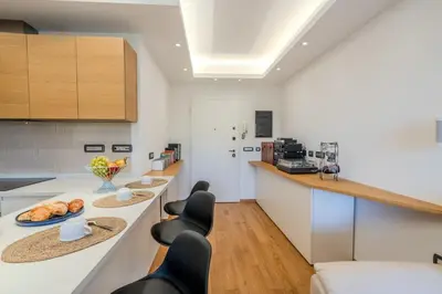 Cucina o angolo cottura di OlbiAmare Appartamento di Lusso