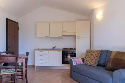 Cucina o angolo cottura di Residenze del Porto - Budoni Sweet Home