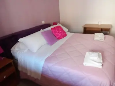 Letto o letti in una camera di Economy Double room, bathroom in shared