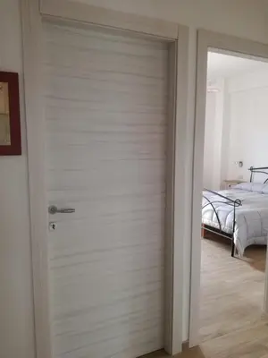 Letto o letti in una camera di Apartment Conchiglie