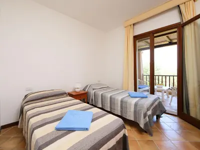 Letto o letti in una camera di Holiday Home Bougainville 6 - Vista Village by Interhome