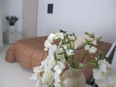 Letto o letti in una camera di Guest House Suite