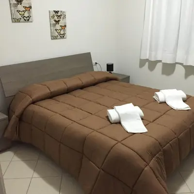Letto o letti in una camera di Guest House Suite