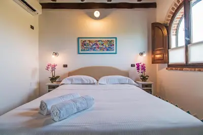 Letto o letti in una camera di Casa La Vela