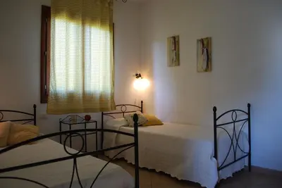 Letto o letti in una camera di Vecchio Stazzo