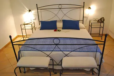 Letto o letti in una camera di Vecchio Stazzo