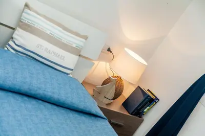 Letto o letti in una camera di Caneis Apartments