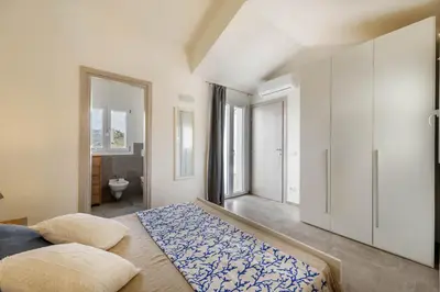 Letto o letti in una camera di Caneis Apartments