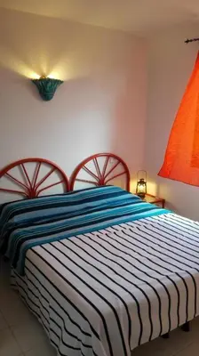 Letto o letti in una camera di Zefiro