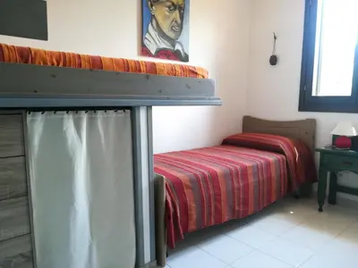 Letto o letti in una camera di Zefiro