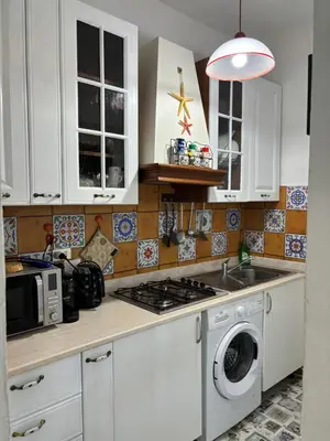Cucina o angolo cottura di appartamento al mare vicino Olbia