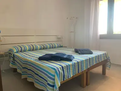 Letto o letti in una camera di Bona Ciurrata