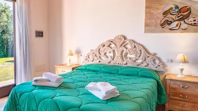 Letto o letti in una camera di QUADRIFOGLIO Affittacamere