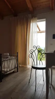 Letto o letti in una camera di Nacchinono