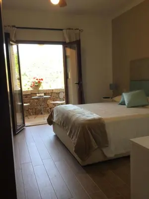Letto o letti in una camera di Il giardino di Daniela