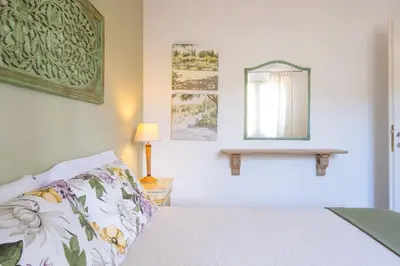 Letto o letti in una camera di Orosei Home Holidays - Sa Vadde