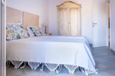 Letto o letti in una camera di Orosei Home Holidays - Sa Vadde