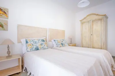 Letto o letti in una camera di Orosei Home Holidays - Sa Vadde