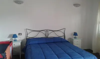 Letto o letti in una camera di Agriturismo Locoe