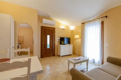 TV o dispositivi per l'intrattenimento presso Appartamento Mare Sardegna Porto San Paolo