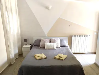 Letto o letti in una camera di B&B Littu
