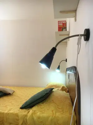 Letto o letti in una camera di Casa Arborea