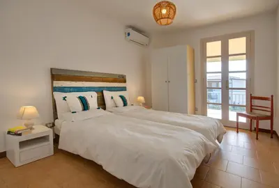 Letto o letti in una camera di Villa Rosa