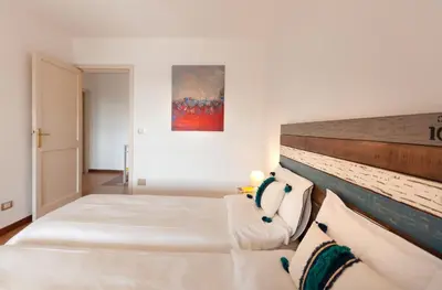 Letto o letti in una camera di Villa Rosa